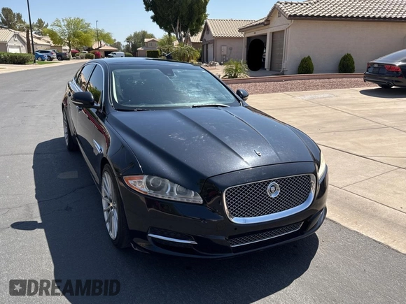 2012 Jaguar XJ with VIN SAJWA2GBXCLV24464, listed as a Copart auction lot 52572955 with 135,087 mi miles and Clean Title. Bid and sale history available at carsss.com. Image 1.