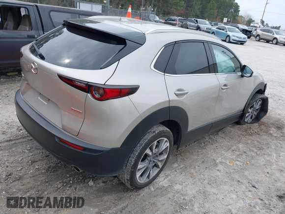2024 Mazda CX-30 S Premium with VIN 3MVDMBDM1RM647840, listed as a IAAI auction lot 41724670 with 14,796 mi miles and . Bid and sale history available at DreamBid. Image 4.