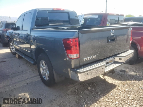 2014 Nissan Titan SV with VIN 1N6AA0ED2EN513724, listed as a Copart auction lot 58641975 with 221,961 mi miles and Salvage title. Bid and sale history available at DreamBid. Image 2.