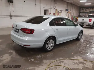 2017 Volkswagen Jetta 1.4T S with VIN 3VW167AJ5HM279535, listed as a IAAI auction lot 41664681 with 98,902 mi miles. Bid and sale history available at carsss.com. Image 4.