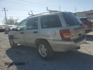 2004 Jeep Grand Cherokee with VIN 1J8GX48S84C329291, listed as a Copart auction lot 43295185 with 234,680 mi miles and Salvage title. Bid and sale history available at DreamBid. Image 2.