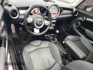 2007 MINI Hardtop S with VIN WMWMF73577TT86065, listed as a Copart auction lot 57262795 with 100,052 mi miles and Salvage Title. Bid and sale history available at DreamBid. Image 8.