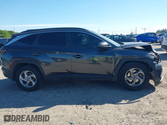 2022 Hyundai Tucson SEL with VIN 5NMJB3AE7NH065963, listed as a IAAI auction lot 41673572 with 55,404 mi miles. Bid and sale history available at carsss.com. Image 14.