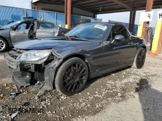 2015 Mazda MX-5 Miata Grand Touring z VIN JM1NC2PF3F0239991, wystawiony jako Copart lot #46989165 z przebiegiem 139 801 mil mil oraz Szkody całkowita. Historia ofert i sprzedaży dostępna na DreamBid. Obrazek 1.