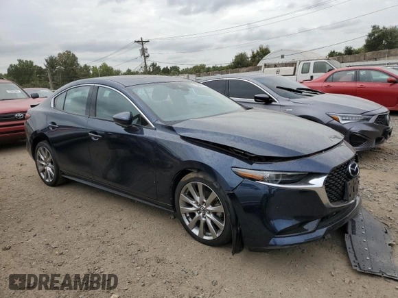 2020 Mazda 3 Premium with VIN 3MZBPBEM6LM126101, listed as a Copart auction lot 72664404 with 19,409 mi miles and Salvage Title. Bid and sale history available at DreamBid. Image 4.