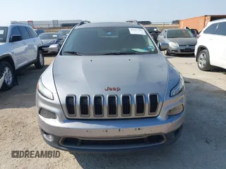 2016 Jeep Cherokee Latitude with VIN 1C4PJLCB7GW256587, listed as a IAAI auction lot 42037539 with 209,267 mi miles. Bid and sale history available at carsss.com. Image 12.