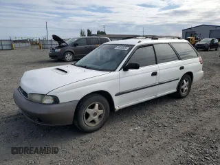1997 Subaru Legacy L with VIN 4S3BK4359V7309059, listed as a Copart auction lot 59600835 with 136,620 mi miles and Salvage title. Bid and sale history available at DreamBid. Image 1.
