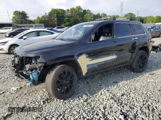 2015 Jeep Grand Cherokee Overland z VIN 1C4RJFCG7FC228584, wystawiony jako Copart lot #55289115 z przebiegiem 194 017 mil mil oraz Szkoda całkowita • Salvage title. Historia ofert i sprzedaży dostępna na DreamBid. Obrazek 1.