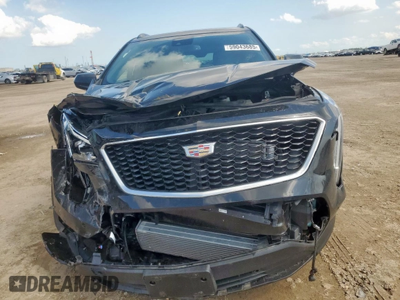 2020 Cadillac XT4 FWD Sport with VIN 1GYFZER45LF146781, listed as a Copart auction lot 59043685 with 65,177 mi miles and Salvage title. Bid and sale history available at DreamBid. Image 5.