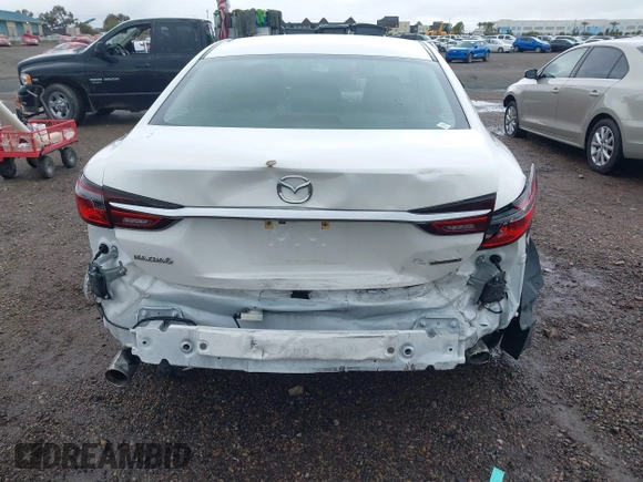 2021 Mazda 6 Touring with VIN JM1GL1VM7M1611070, listed as a IAAI auction lot 41755673 with 46,288 mi miles and . Bid and sale history available at carsss.com. Image 16.