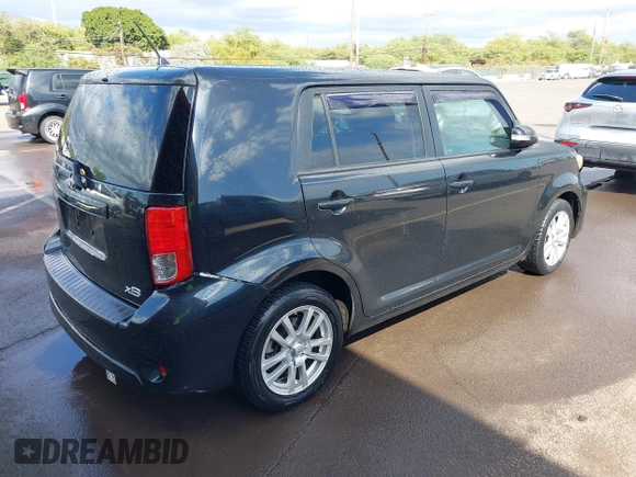 2014 Scion xB with VIN JTLZE4FE4EJ064549, listed as a IAAI auction lot 41392280 with 148,962 mi miles. Bid and sale history available at carsss.com. Image 4.
