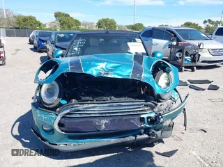 2016 MINI Convertible z VIN WMWWG5C5XG3A83276, wystawiony jako IAAI lot #41864830 z przebiegiem 103 721 mil mil oraz . Historia ofert i sprzedaży dostępna na DreamBid. Obrazek 12.