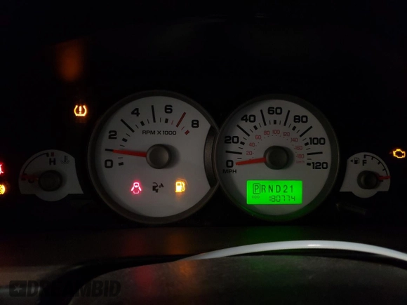 2007 Ford Escape XLS with VIN 1FMCU92Z77KA84801, listed as a Copart auction lot 82052144 with 180,774 mi miles and Salvage title. Bid and sale history available at DreamBid. Image 9.