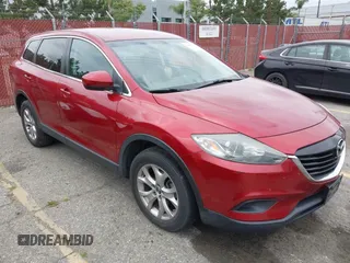 2015 Mazda CX-9 Touring with VIN JM3TB2CV5F0458675, listed as a IAAI auction lot 42047786 with 120,890 mi miles and . Bid and sale history available at carsss.com. Image 1.