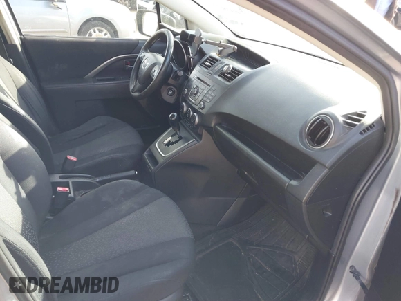 2012 Mazda 5 Sport z VIN JM1CW2BL6C0129489, wystawiony jako IAAI lot #41478677 z przebiegiem 259 261 mil mil oraz . Historia ofert i sprzedaży dostępna na DreamBid. Obrazek 5.