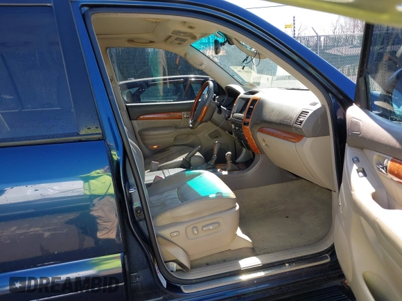 2005 Lexus GX with VIN JTJBT20XX50081621, listed as a IAAI auction lot 41661384 with 208,071 mi miles. Bid and sale history available at carsss.com. Image 5.