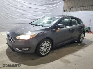 2015 Ford Focus Titanium with VIN 1FADP3N2XFL321128, listed as a Copart auction lot 50796845 with 156,700 mi miles and Clean Title. Bid and sale history available at carsss.com. Image 1.