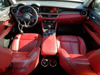 2019 Alfa Romeo Stelvio Ti Lusso z VIN ZASPAKBN2K7C49899, wystawiony jako Copart lot #77323474 z przebiegiem 88 826 mil mil oraz Szkoda całkowita • Salvage title. Historia ofert i sprzedaży dostępna na DreamBid. Obrazek 8.