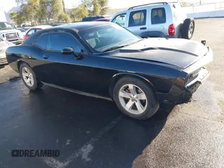 2012 Dodge Challenger SXT Plus z VIN 2C3CDYAG6CH125164, wystawiony jako IAAI lot #41754809 z przebiegiem 95 882 mil mil oraz . Historia ofert i sprzedaży dostępna na DreamBid. Obrazek 19.
