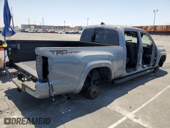 2021 Toyota Tacoma SR5 with VIN 3TMBZ5DNXMM031339, listed as a Copart auction lot 59178515 with 27,885 mi miles and Salvage title. Bid and sale history available at DreamBid. Image 3.