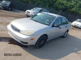 2007 Ford Focus S with VIN 1FAFP34NX7W265017, listed as a IAAI auction lot 42415556 with 71,840 mi miles and . Bid and sale history available at DreamBid. Image 2.