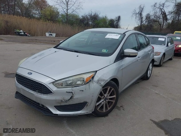 2015 Ford Focus SE with VIN 1FADP3K25FL345874, listed as a IAAI auction lot 41972589 with 155,001 mi miles. Bid and sale history available at carsss.com. Image 2.