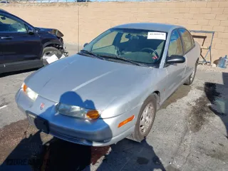 2002 Saturn SL with VIN 1G8ZK52742Z178494, listed as a IAAI auction lot 41408870 with 115,164 mi miles. Bid and sale history available at carsss.com. Image 2.