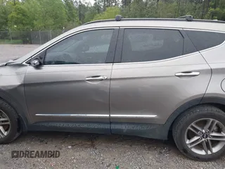 2017 Hyundai Santa Fe 2.4L z VIN 5XYZU3LB8HG421397, wystawiony jako IAAI lot #41961915 z przebiegiem 102 594 mil mil oraz . Historia ofert i sprzedaży dostępna na DreamBid. Obrazek 14.