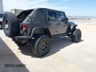 2014 Jeep Wrangler Unlimited Rubicon с VIN 1C4BJWFG2EL279938, выставлен на аукционе IAAI как лот 41920729 с пробегом 76 418 миль миль и . История ставок и продаж доступна на DreamBid. Изображение 4.