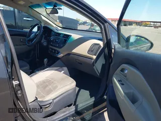 2014 Kia Rio LX with VIN KNADM4A39E6364490, listed as a IAAI auction lot 42128702 with 130,981 mi miles and . Bid and sale history available at DreamBid. Image 5.