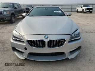 2017 BMW M6 z VIN WBS6E9C56HG437374, wystawiony jako Copart lot #54277624 z przebiegiem 80 858 mil mil oraz . Historia ofert i sprzedaży dostępna na DreamBid. Obrazek 5.