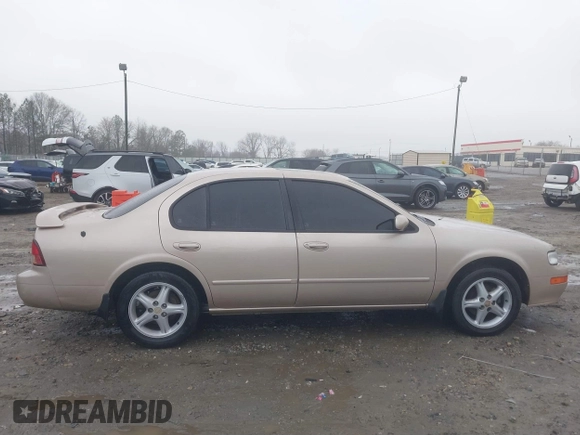 1998 Nissan Maxima GXE with VIN JN1CA21D6WM923286, listed as a IAAI auction lot 41555099 with 134,005 mi miles and . Bid and sale history available at DreamBid. Image 13.