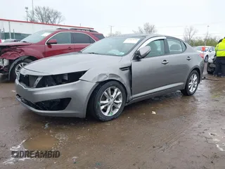2013 Kia Optima EX z VIN 5XXGN4A72DG166687, wystawiony jako IAAI lot #41967631 z przebiegiem 202 712 mil mil oraz . Historia ofert i sprzedaży dostępna na DreamBid. Obrazek 2.