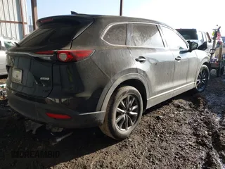 2016 Mazda CX-9 Touring with VIN JM3TCACY8G0102157, listed as a IAAI auction lot 41670673 with 87,796 mi miles and . Bid and sale history available at carsss.com. Image 4.