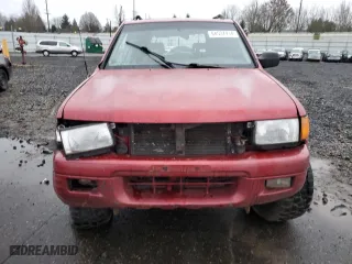 1998 Isuzu Rodeo S with VIN 4S2CM58W5W4350575, listed as a Copart auction lot 84537714 with 215,573 mi miles and Salvage Title. Bid and sale history available at carsss.com. Image 5.