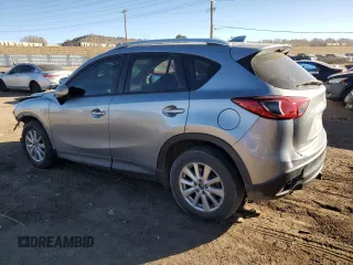 2015 Mazda CX-5 Sport with VIN JM3KE4BY4F0492326, listed as a Copart auction lot 44405875 with 207,031 mi miles and Clean Title. Bid and sale history available at carsss.com. Image 2.