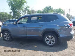2018 Volkswagen Atlas SE with VIN 1V2KR2CA3JC504717, listed as a IAAI auction lot 42414174 with 105,909 mi miles and . Bid and sale history available at DreamBid. Image 14.