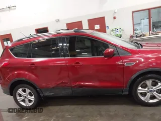 2014 Ford Escape SE z VIN 1FMCU9GX5EUA05294, wystawiony jako IAAI lot #42282028 z przebiegiem 119 046 mil mil oraz . Historia ofert i sprzedaży dostępna na DreamBid. Obrazek 13.