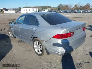 2005 Acura TSX with VIN JH4CL96955C005049, listed as a IAAI auction lot 40809563 with 140,000 mi miles. Bid and sale history available at carsss.com. Image 3.