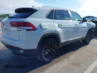 2023 Volkswagen Atlas SE with VIN 1V2WC2CA3PC228213, listed as a IAAI auction lot 42330049 with 21,884 mi miles and . Bid and sale history available at DreamBid. Image 4.