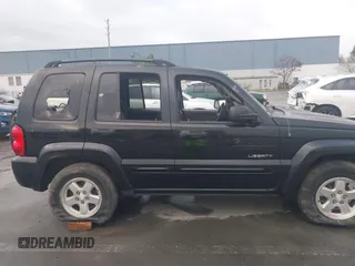 2004 Jeep Liberty Limited with VIN 1J4GL58K94W318379, listed as a IAAI auction lot 41802645 with 275,834 mi miles. Bid and sale history available at carsss.com. Image 13.