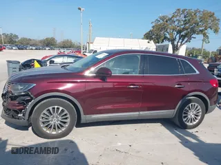 2017 Lincoln MKX Select with VIN 2LMPJ6KP4HBL37256, listed as a IAAI auction lot 41592553 with 74,231 mi miles. Bid and sale history available at carsss.com. Image 14.