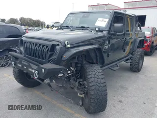 2020 Jeep Gladiator Rubicon z VIN 1C6JJTBG7LL102189, wystawiony jako IAAI lot #42320968 z przebiegiem 68 266 mil mil oraz . Historia ofert i sprzedaży dostępna na DreamBid. Obrazek 2.