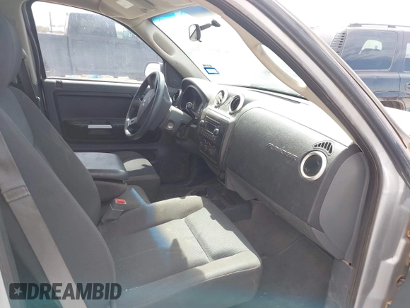 2006 Mitsubishi Raider LS z VIN 1Z7HT28KX6S576515, wystawiony jako IAAI lot #42180535 z przebiegiem 169 922 mil mil oraz . Historia ofert i sprzedaży dostępna na DreamBid. Obrazek 5.