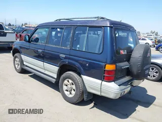 1995 Mitsubishi Montero z VIN JA4MR41H4SJ006684, wystawiony jako IAAI lot #42389482 z przebiegiem 399 099 mil mil oraz . Historia ofert i sprzedaży dostępna na DreamBid. Obrazek 3.