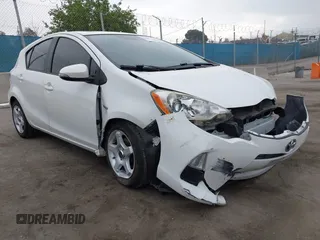 2013 Toyota Prius One with VIN JTDKDTB32D1032454, listed as a IAAI auction lot 42087724 with 202,293 mi miles. Bid and sale history available at carsss.com. Image 1.