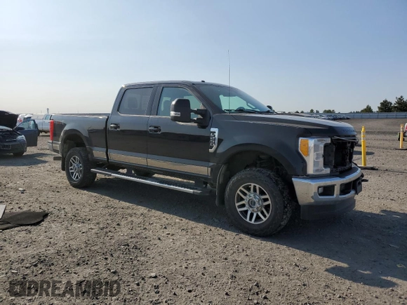 2017 Ford F-250 Lariat with VIN 1FT7W2B6XHEE59786, listed as a Copart auction lot 59812305 with 67,630 mi miles and Salvage title. Bid and sale history available at DreamBid. Image 4.