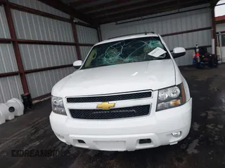 2014 Chevrolet Suburban LT with VIN 1GNSCJE05ER153658, listed as a IAAI auction lot 41867781 with 252,098 mi miles. Bid and sale history available at carsss.com. Image 12.