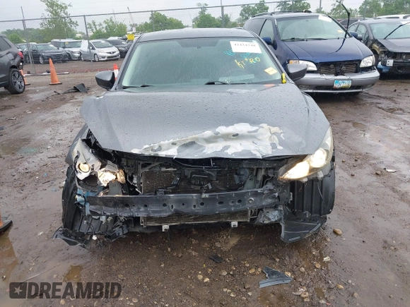 2014 Mazda 3 i Touring z VIN JM1BM1L70E1212930, wystawiony jako IAAI lot #42434348 z przebiegiem 107 209 mil mil oraz . Historia ofert i sprzedaży dostępna na DreamBid. Obrazek 13.