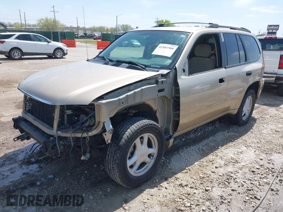 2005 GMC Envoy SLE with VIN 1GKDT13S252264932, listed as a IAAI auction lot 41981566 with 140,566 mi miles. Bid and sale history available at carsss.com. Image 18.